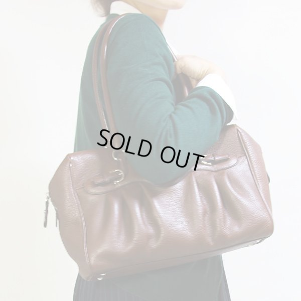 フェラガモ  ガンチーニ ミニボストンショルダーバック DY-21 6880 ブラウン 掛けたイメージ