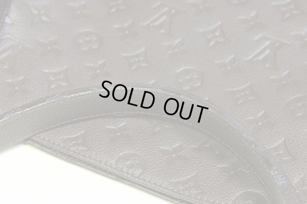 持ち手・ショルダー縁周りコーティングに、スレ・凹み跡が所々に見られます。