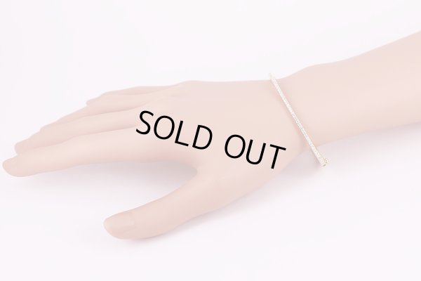 デビアス    750YG ダイアイリブレスレット 13.30g　装着イメージ