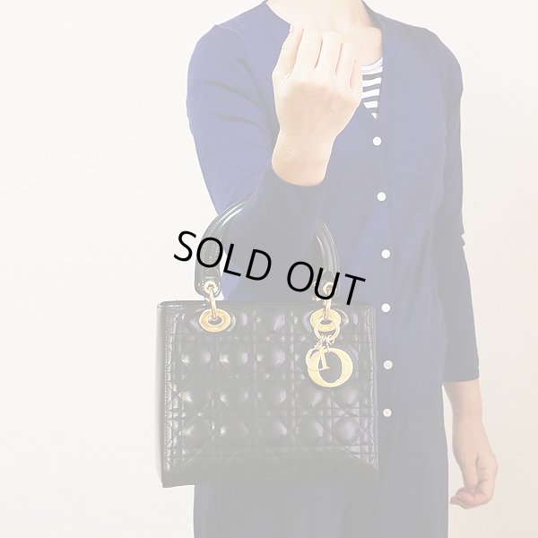 クリスチャンディオール レディディオール ハンドバック VGS44550 ブラック／ゴールド金具　持ったイメージ