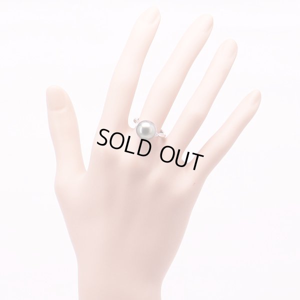 PT900 黒蝶パールダイアイリリング 11.50mm 0.11ct 7.20g　装着イメージ