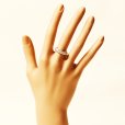 セリーヌ　PT900 ダイアイリリング 0.76ct 0.03ct 6.00g　装着イメージ