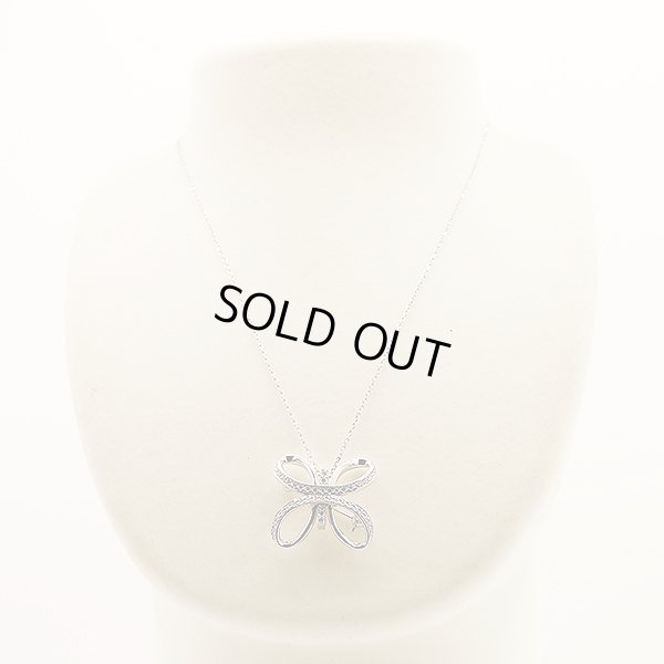 ミキモト　K18WG ダイアイリペンダントネックレス／ブローチ 0.15ct 0.37ct 11.00g　装着イメージ