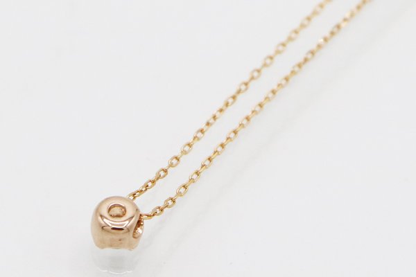 ４℃　K18PG ダイアイリペンダントネックレス1.00g　裏面
