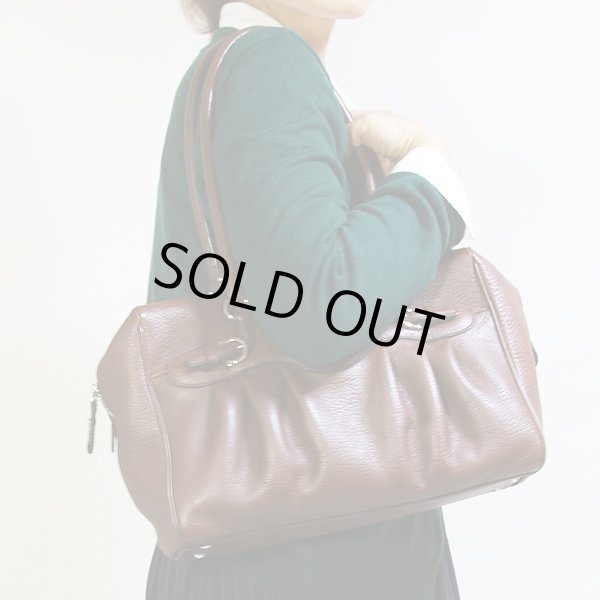 フェラガモ  ガンチーニ ミニボストンショルダーバック DY-21 6880 ブラウン　掛けたイメージ