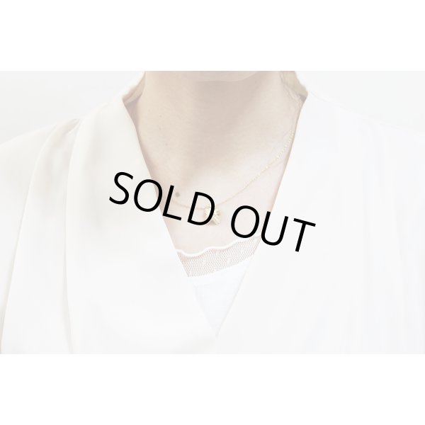 ティファニー 750YG シグネチャー ダイアイリペンダントネックレス 4.40g　装着イメージ