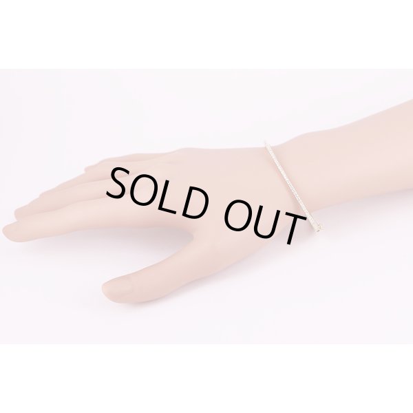 デビアス    750YG ダイアイリブレスレット 13.30g　装着イメージ