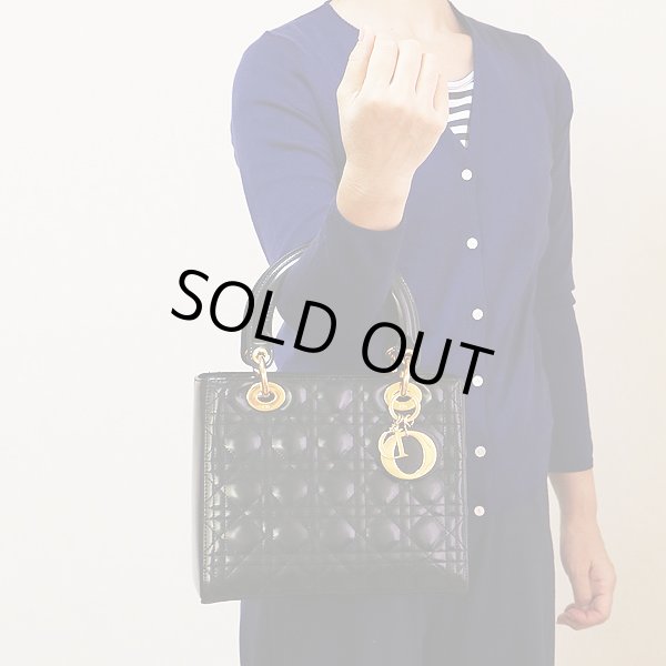 クリスチャンディオール レディディオール ハンドバック VGS44550 ブラック／ゴールド金具　持ったイメージ