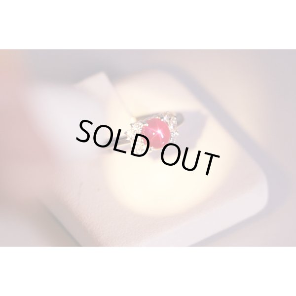 PT900 スタールビーダイアイリリング 1.55ct 0.22ct 4.50g　光を当てるとスターのような形の輝き