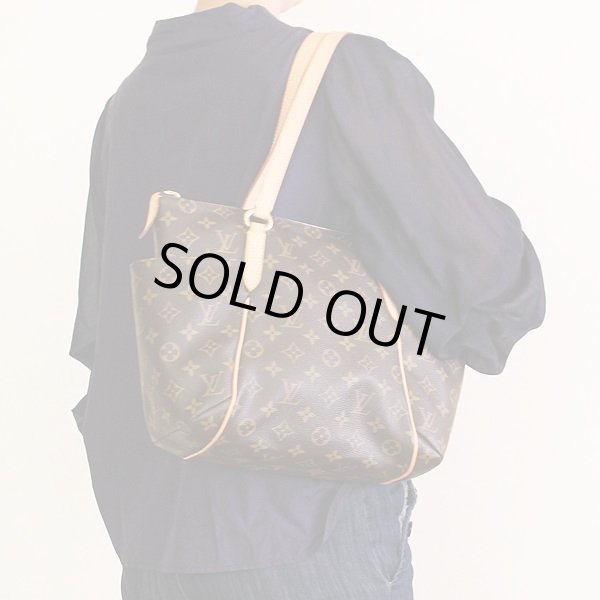 ルイ・ヴィトン　トータリーＰＭ　Ｍ56688　ＤＵ2039　掛けたイメージ