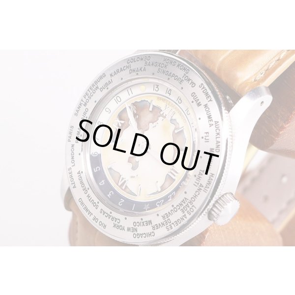 シェルマン　ワールドタイム　ミニッツリピーター　クロワゾネ　茶文字盤　サイド拡大