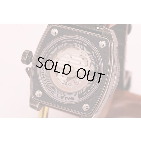 タックス　ヴィンテージレンズ２　ＴＳ１８０３Ｋ　黒文字盤　タックス１０周年限定５００本　裏面拡大