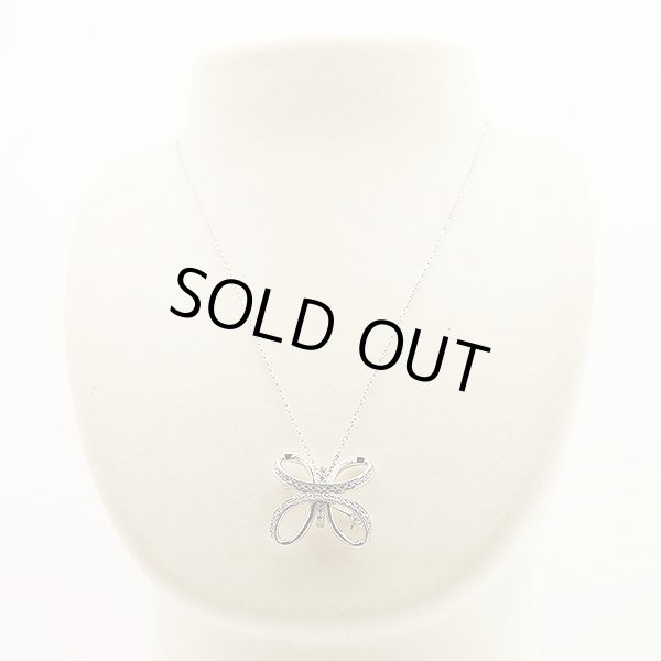 ミキモト　K18WG ダイアイリペンダントネックレス／ブローチ 0.15ct 0.37ct 11.00g　装着イメージ