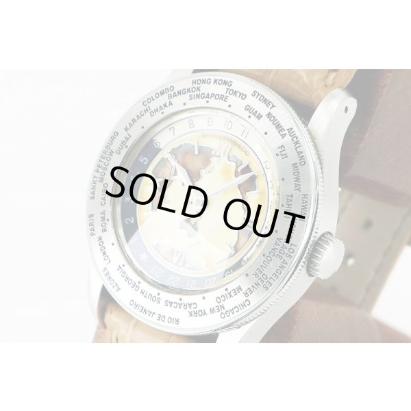 シェルマン　ワールドタイムミニッツリピータークロワゾネ　茶文字盤　サイド拡大