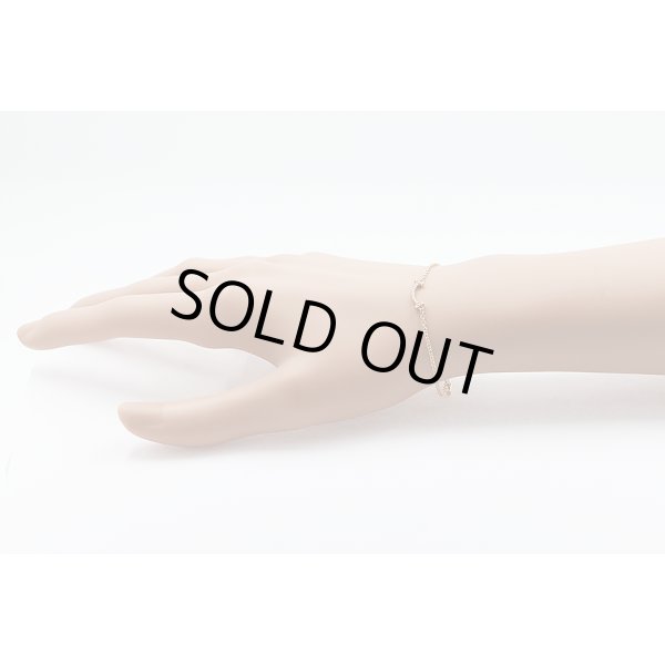 ティファニー　750PG スマイル ダイアイリブレスレット 1.60g　装着イメージ